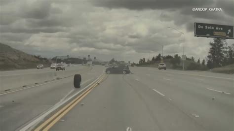 Runaway tire launches car into midair spin on 118 Freeway in Los Angeles: video